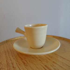 Fiesta Pale Yellow Stick Handled Demi Cup & Saucer Retired