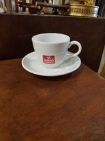 Fiesta White Cup and Saucer with Tasters Choice On It