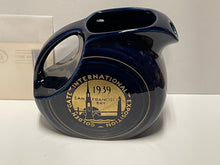 Load image into Gallery viewer, EXTREMELY RARE ! FIESTA HLCCA JUICE PITCHER 1939 COBALT NEW YORK WORLD FAIR

